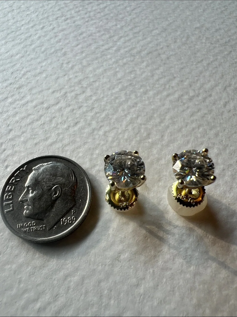 Sterling Silver Clear Stone Stud Earrings in Gold-Tone Setting